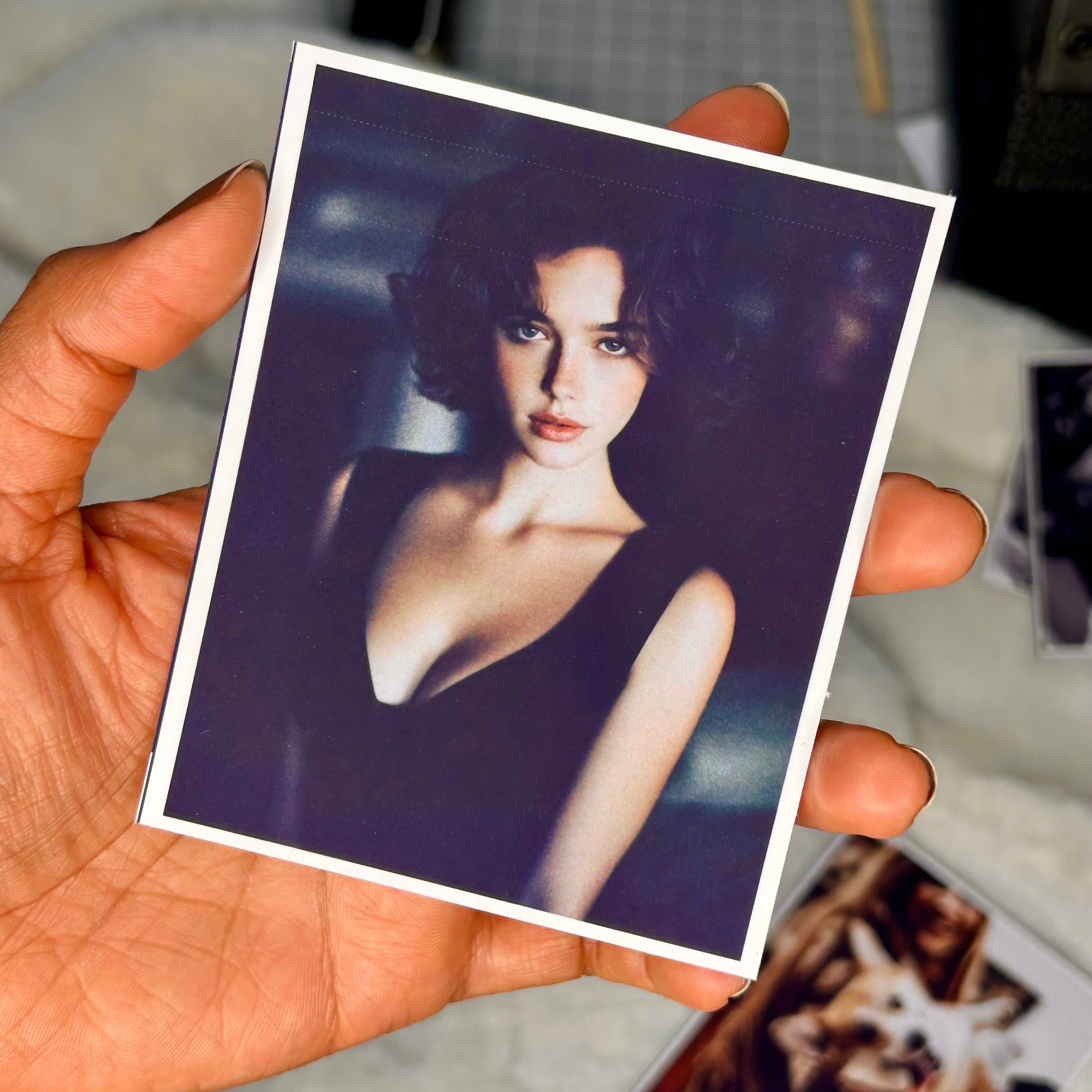 Custom photo magnet with portrait printed on premium glossy photo paper.